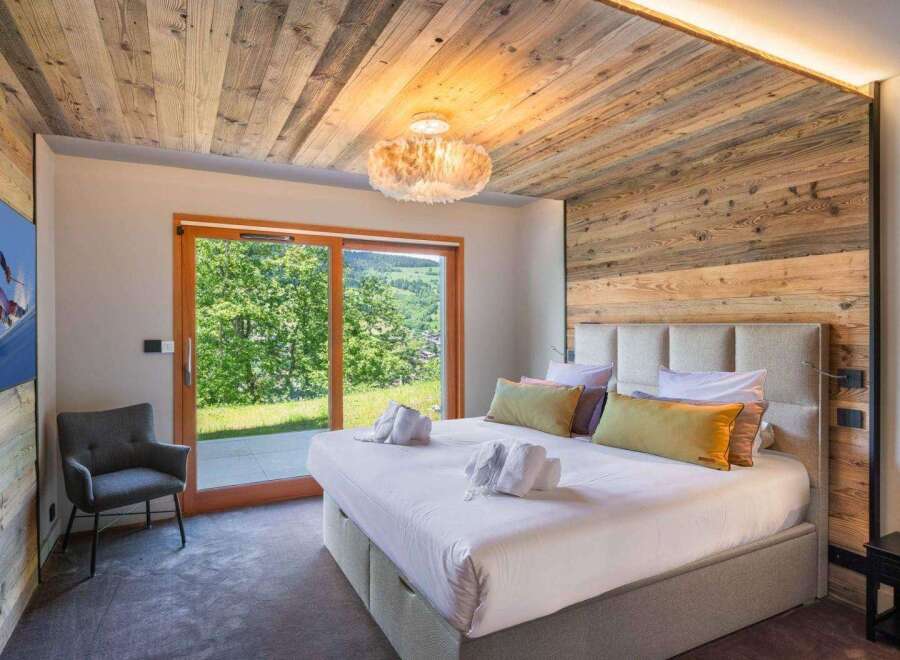 Experience luxury and tranquility in this stunning bedroom.