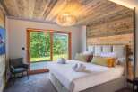 Experience luxury and tranquility in this stunning bedroom.