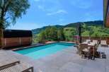 Enjoy breathtaking mountain views from this luxurious property featuring a private pool and a relaxing sauna.