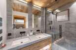 Experience luxury in this stunning bathroom, featuring a sleek design and high-end finishes.