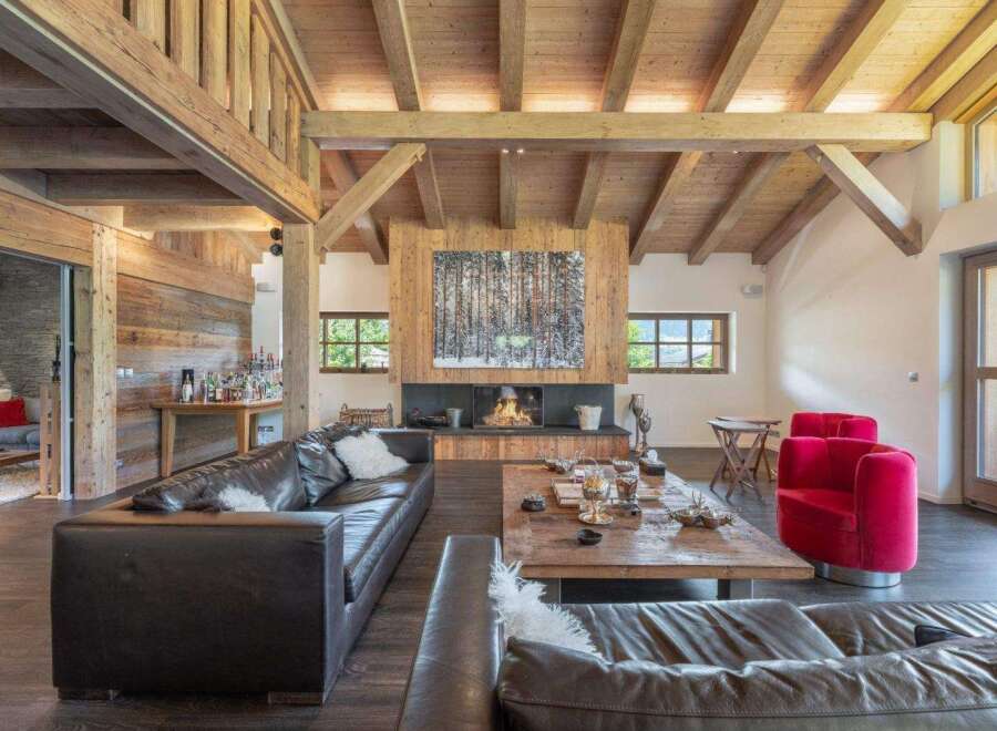 This stunning property boasts a warm and inviting living space, perfect for relaxation and entertaining.