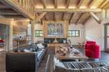 This stunning property boasts a warm and inviting living space, perfect for relaxation and entertaining.