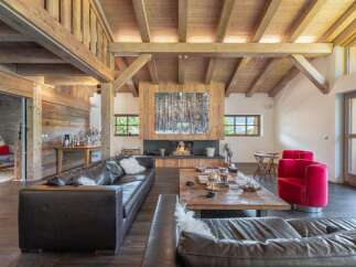 This stunning property boasts a warm and inviting living space, perfect for relaxation and entertaining.