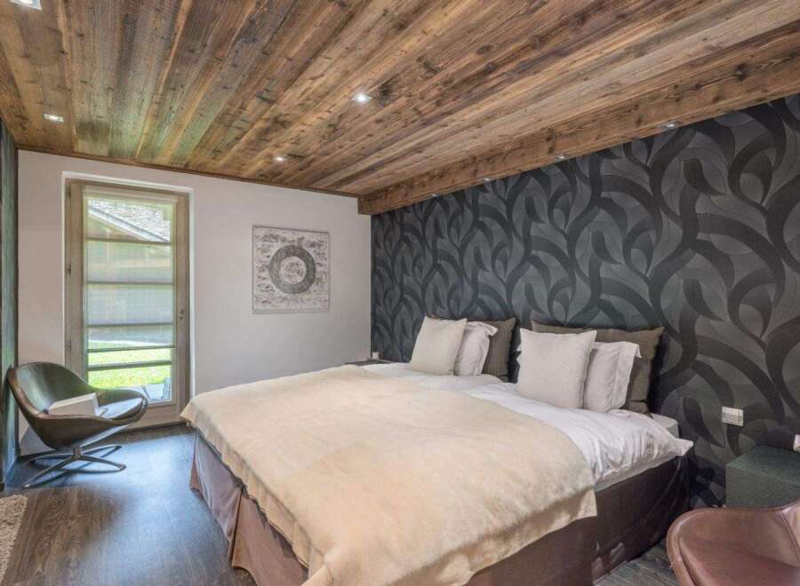 Experience the epitome of comfort and style in this luxurious bedroom.