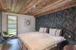 Experience the epitome of comfort and style in this luxurious bedroom.