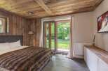 Experience rustic charm in this cozy bedroom.