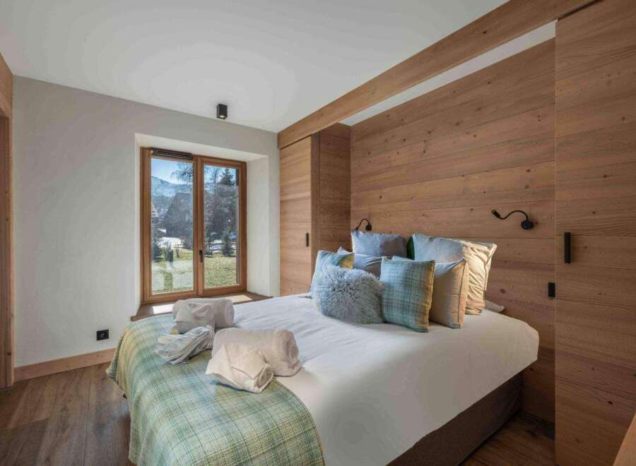 Experience the epitome of comfort in this stunning bedroom.