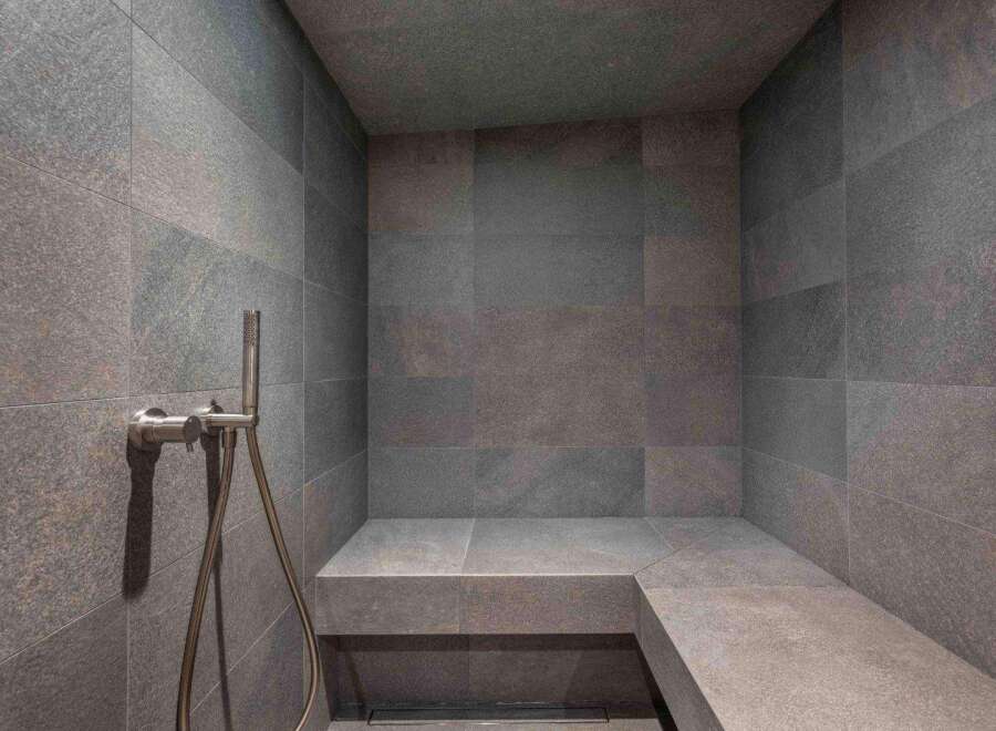Step into luxury with this stunning shower featuring sleek, modern design.