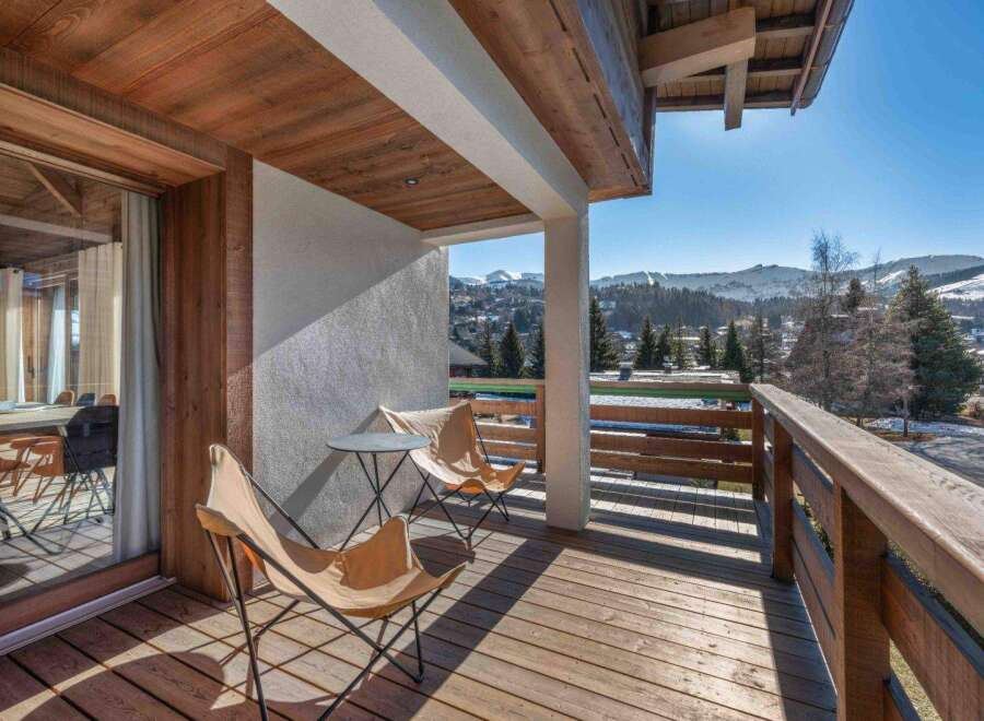 Enjoy breathtaking mountain views from this stunning balcony.