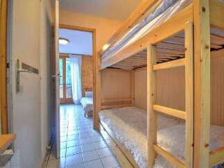 This charming property features a cozy bunk bed setup, perfect for families or groups.