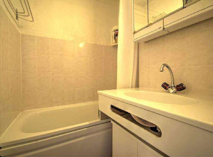 This bathroom features a clean and functional design, perfect for a comfortable living experience.