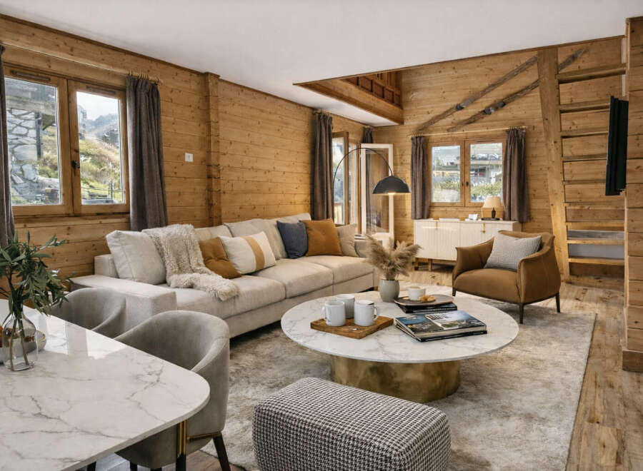 This stunning property boasts a warm and inviting living space, perfect for relaxation and entertaining.