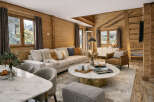 This stunning property boasts a warm and inviting living space, perfect for relaxation and entertaining.