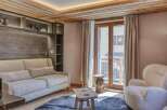 Step into luxury with this stunning property featuring a cozy living room.