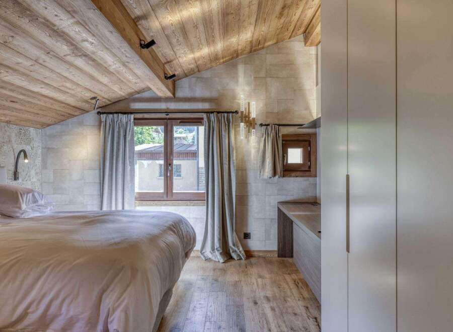 Experience rustic elegance in this stunning bedroom.
