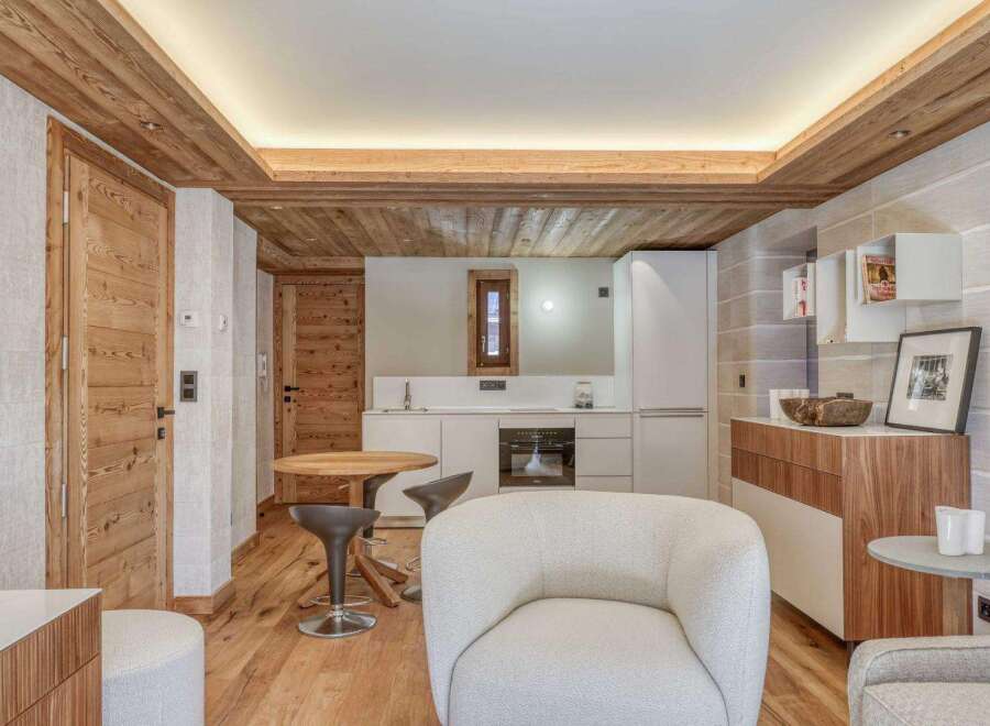 Discover the charm of this stunning property, featuring a beautifully designed interior with wooden accents and modern amenities.