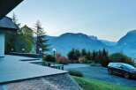 Experience the tranquility of this stunning property nestled amidst breathtaking mountain views.