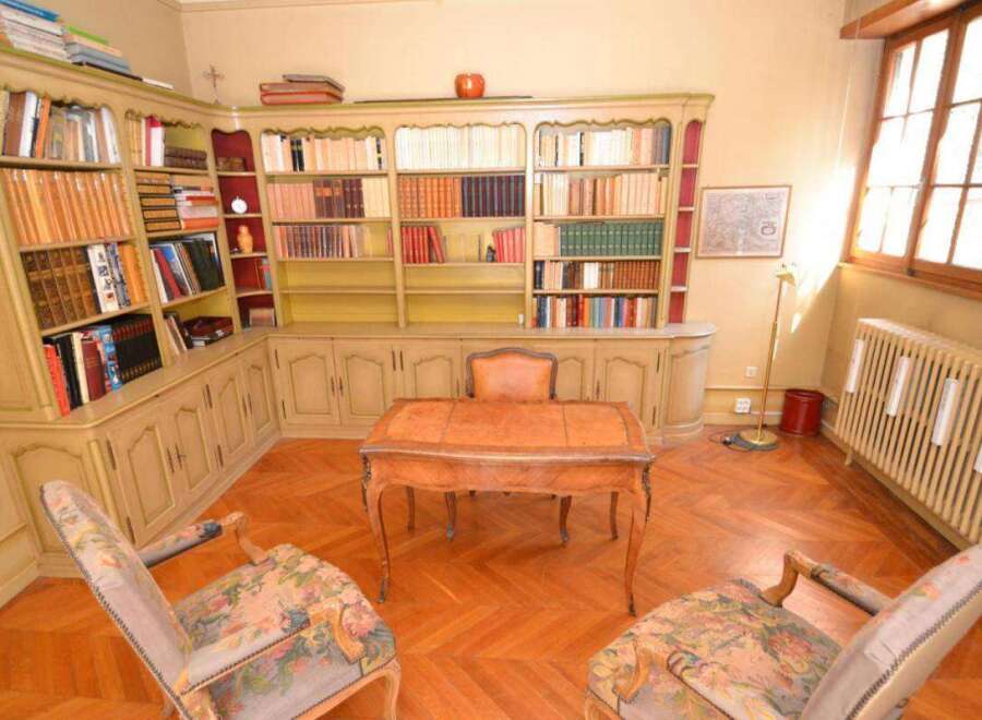 Step into a world of classic elegance with this stunning library.