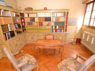 Step into a world of classic elegance with this stunning library.