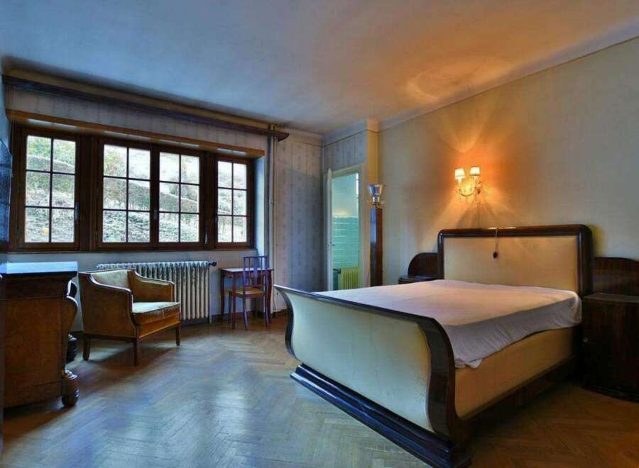 Step into this elegant bedroom, showcasing a blend of classic design and modern comfort.