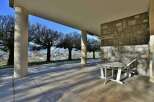 Enjoy breathtaking views from this stunning property! This outdoor space features a charming table and chair set, perfect for relaxing and taking in the scenery.