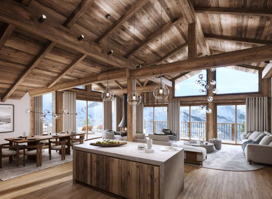 Experience luxury living in this stunning chalet, boasting a warm and inviting interior with exposed wooden beams and a cozy fireplace.