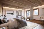 Experience luxury and comfort in this stunning bedroom.