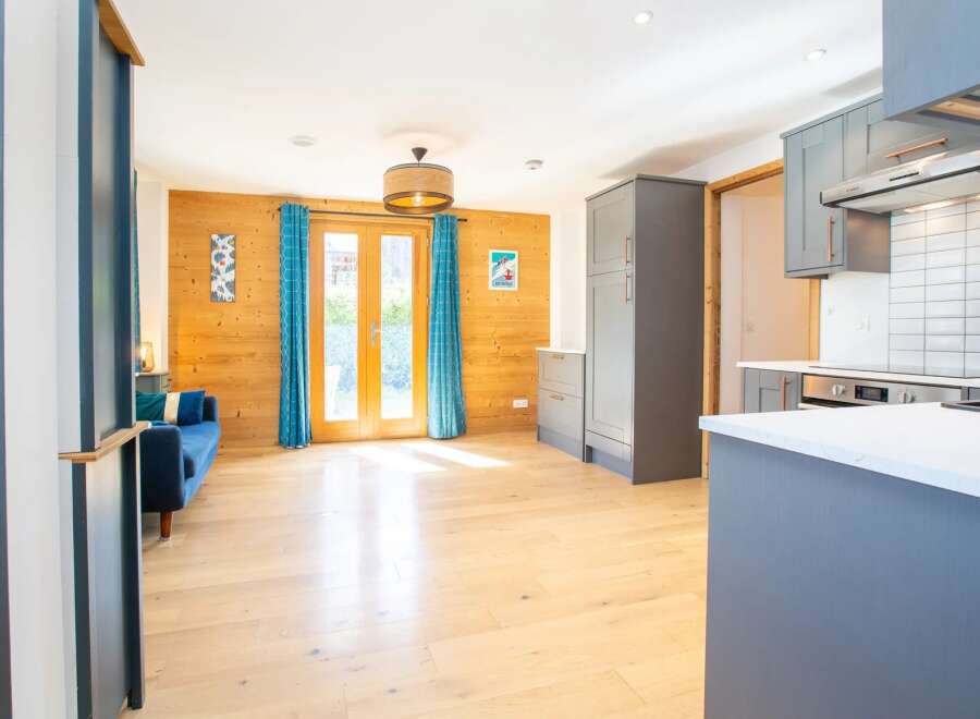 This stunning property boasts a bright and airy open-plan living space, perfect for modern living.