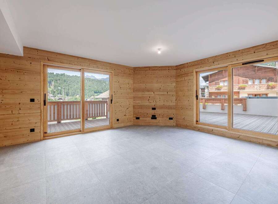 Experience the charm of this stunning property, featuring exquisite wooden paneling and expansive windows that flood the space with natural light.
