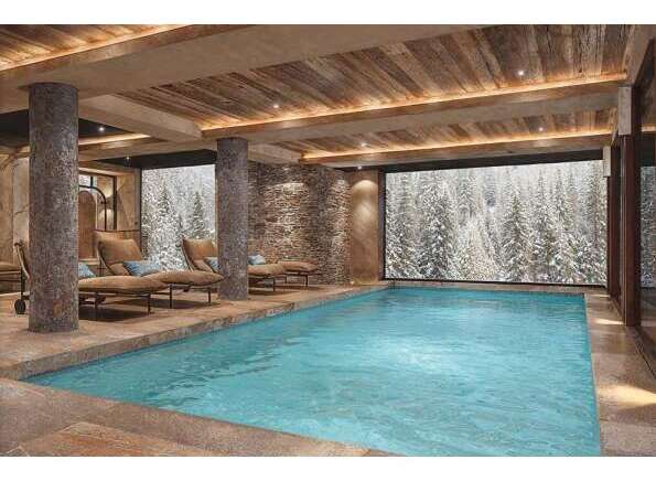 Indulge in luxury with this stunning indoor pool, offering a serene escape.
