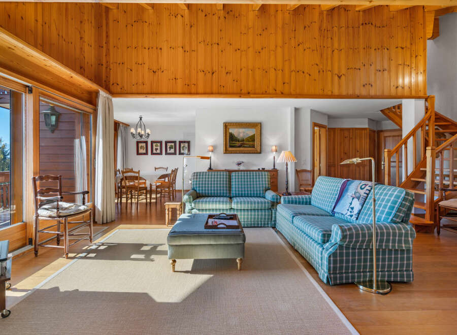 Step into a world of rustic elegance with this stunning property, featuring a warm and inviting interior.