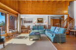 Step into a world of rustic elegance with this stunning property, featuring a warm and inviting interior.