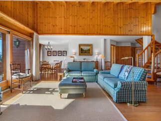 Step into a world of rustic elegance with this stunning property, featuring a warm and inviting interior.