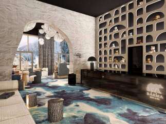 Step into the luxurious Bârma Hotel & Spa, where modern design meets alpine charm.