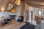 This stunning property boasts a modern interior with a cozy fireplace, perfect for those chilly evenings.