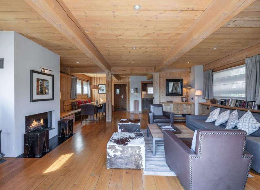 Experience the warmth and charm of this stunning property, featuring a cozy fireplace and inviting living spaces.