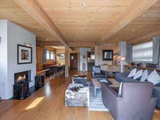 Experience the warmth and charm of this stunning property, featuring a cozy fireplace and inviting living spaces.