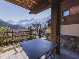 Experience breathtaking mountain views from this charming chalet.