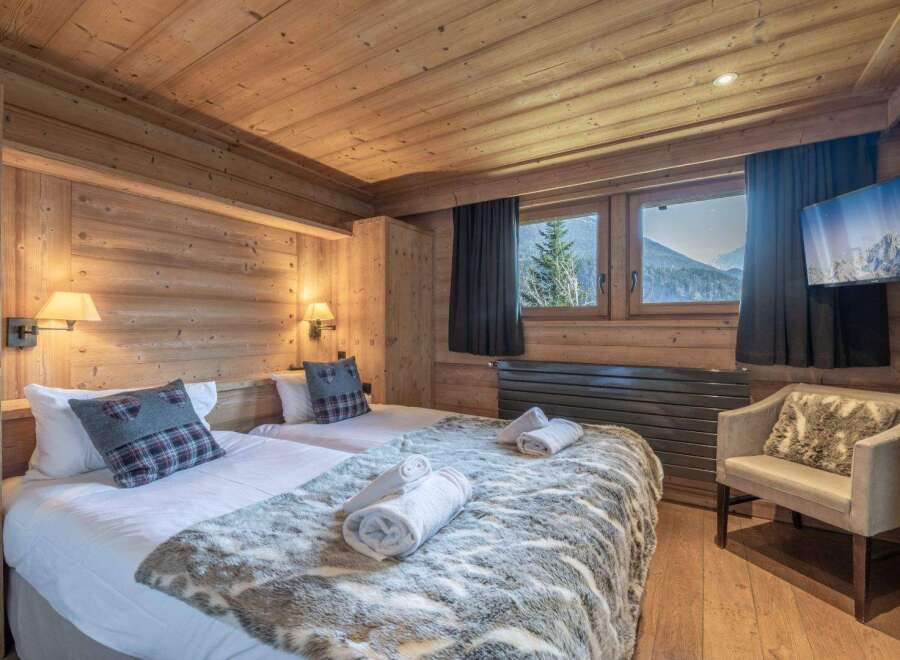 Experience the ultimate in alpine luxury with this stunning bedroom.