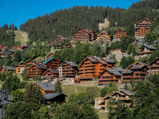 Nestled in a picturesque mountain setting, this stunning property offers a unique blend of luxury and natural beauty.