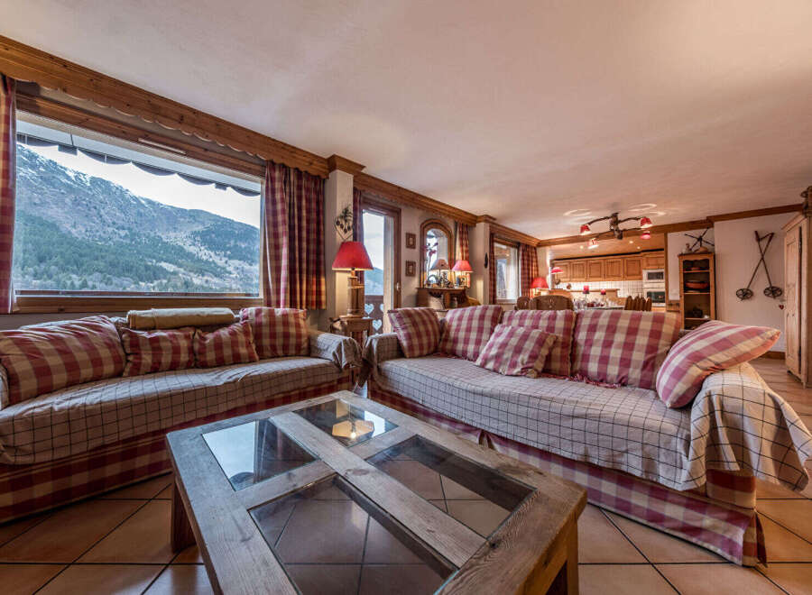 Experience the charm of this cozy living space, perfect for relaxation and entertaining.