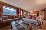 Experience the charm of this cozy living space, perfect for relaxation and entertaining.