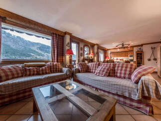Experience the charm of this cozy living space, perfect for relaxation and entertaining.