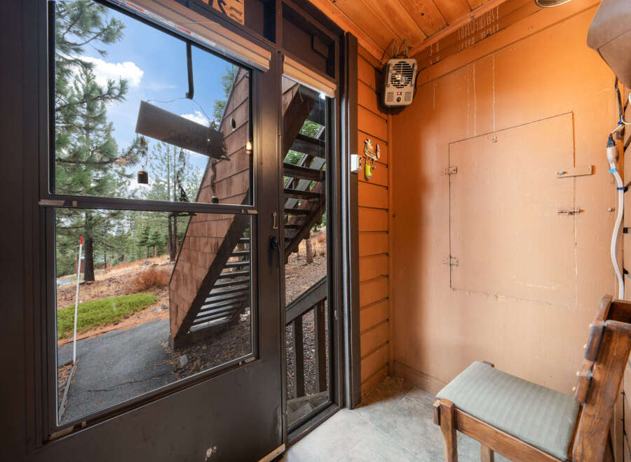 Step into this charming cabin and be greeted by a cozy entryway.