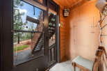 Step into this charming cabin and be greeted by a cozy entryway.