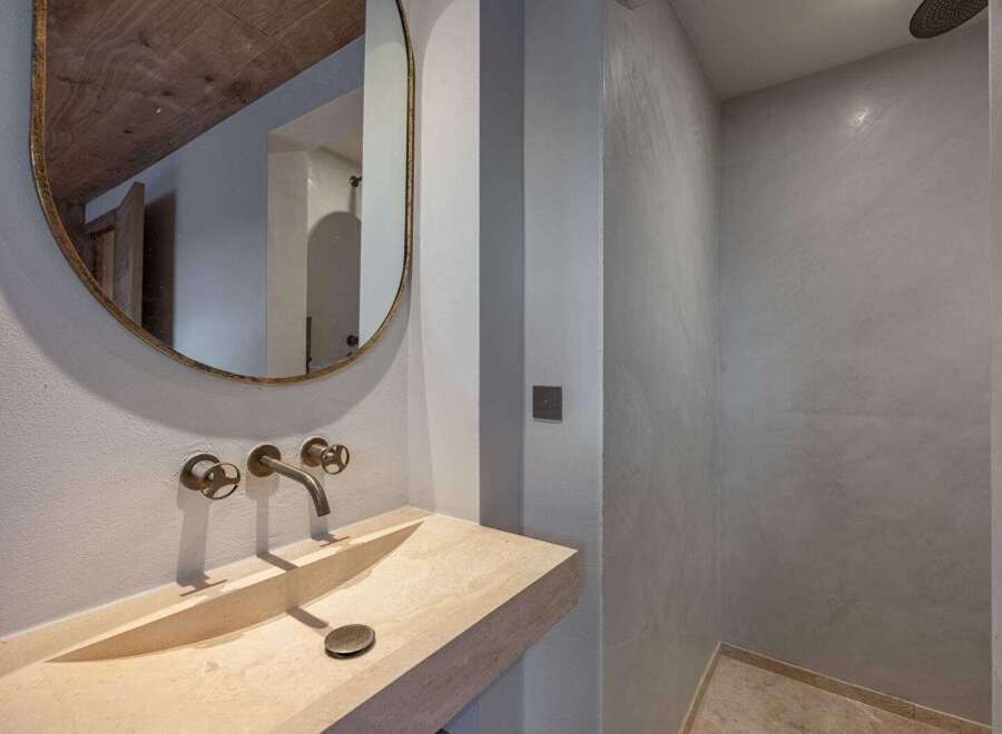 Experience luxury in this stunning bathroom featuring a sleek, modern design.