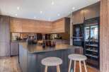 This stunning kitchen boasts a modern design with high-end finishes.