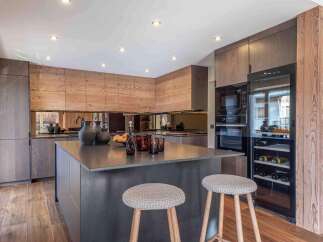 This stunning kitchen boasts a modern design with high-end finishes.