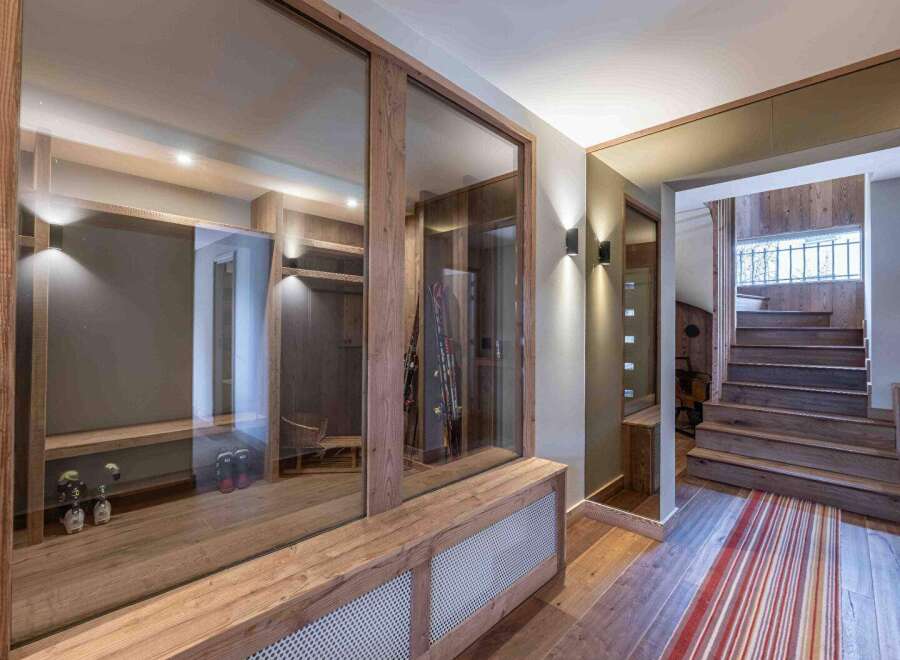 This stunning property boasts a modern interior with a focus on natural materials.
