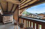 Enjoy breathtaking mountain views from this luxurious balcony.